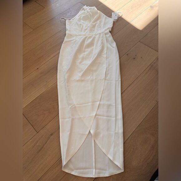 Julia Jordan
Knot Halter Neck Sleeveless Faux Wrap Tulip Hem Midi Dress IVORY - Picture 2 of 7